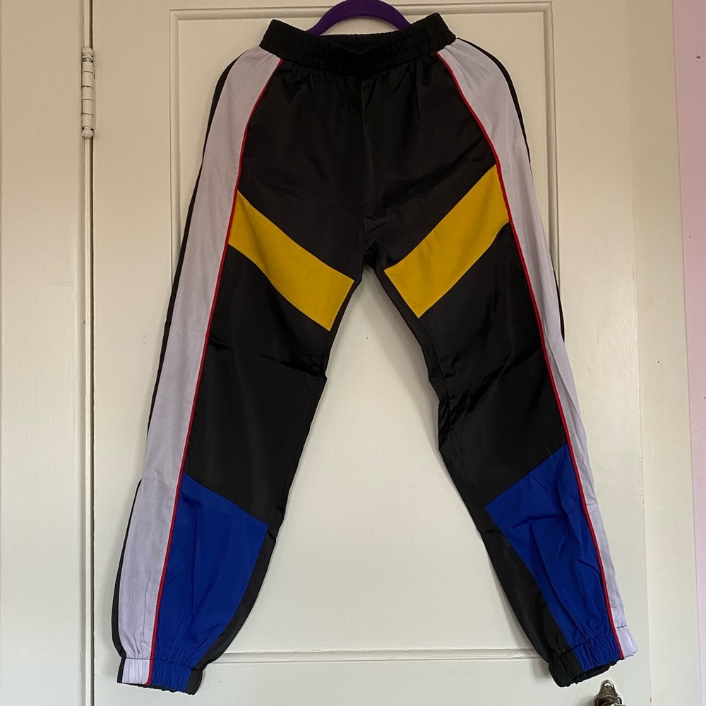 color block track pants, black, white, yellow and blue